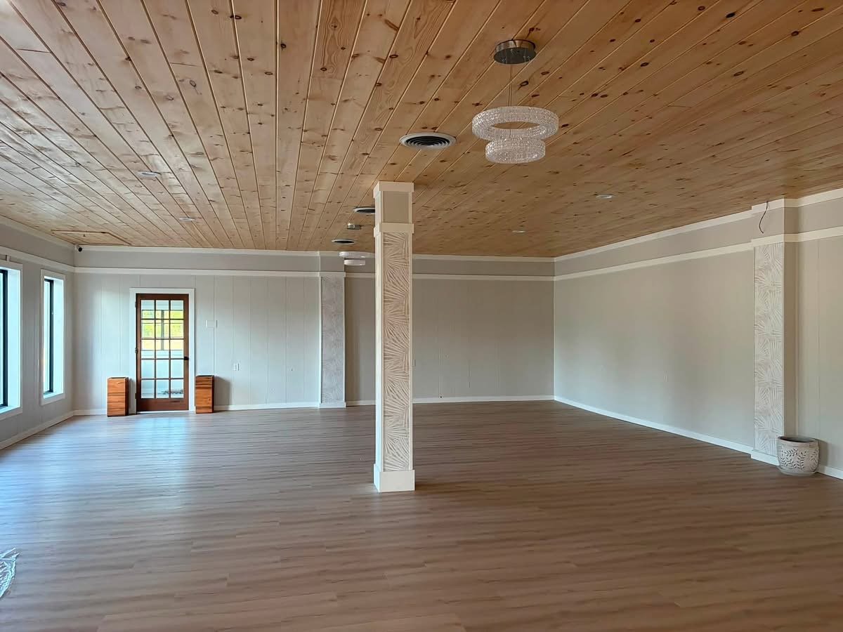 Wide view of the main event room at MeetUps Event Center with open floor space for tables, guests, and flexible layouts